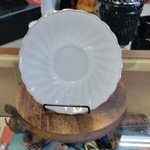 Elegant White Porcelain Saucer with Gold Trim